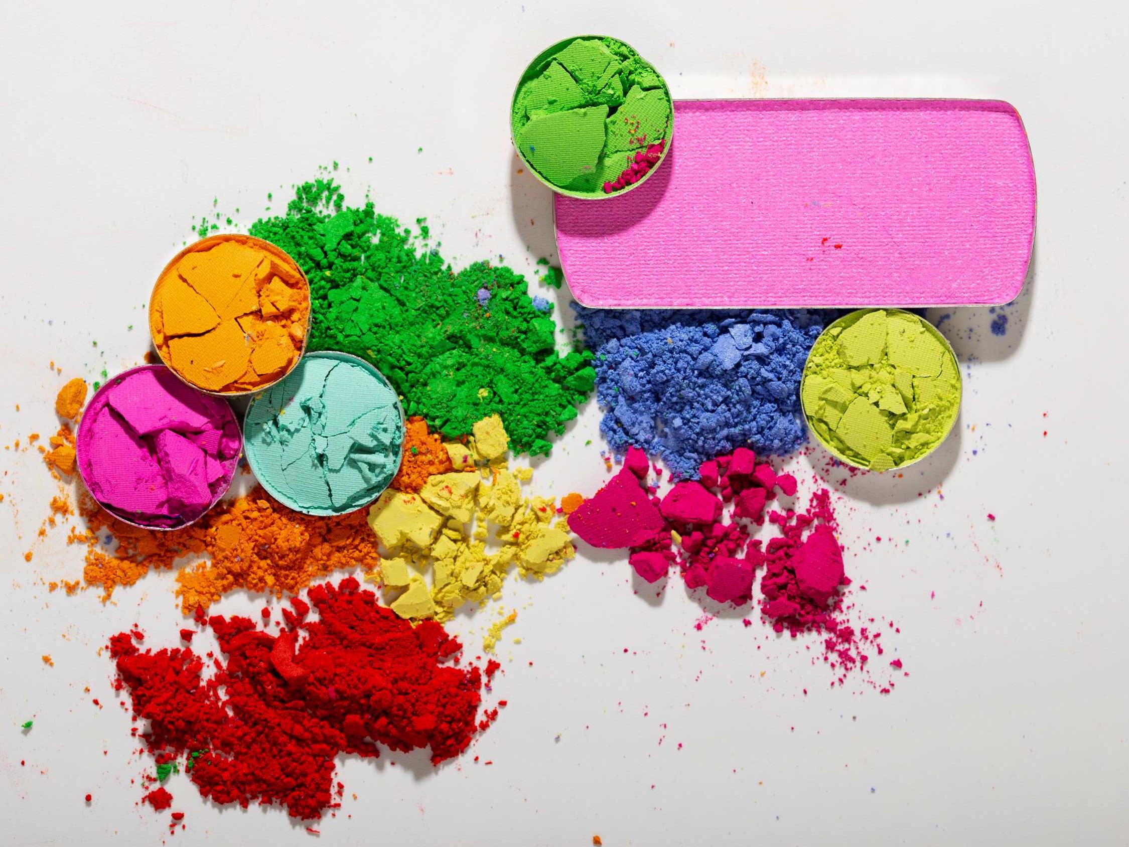 top-view-colorful-eyeshadow-white-background(1).jpg